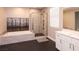 The bathroom boasts a tub and separate glass-enclosed shower at 2650 Skylark Trail St, Henderson, NV 89044