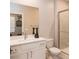 Elegant bathroom featuring a modern vanity, stylish mirror, and glass-enclosed shower at 2650 Skylark Trail St, Henderson, NV 89044