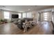 Open-concept living space features stylish decor, plank flooring, and a bright, airy atmosphere at 2650 Skylark Trail St, Henderson, NV 89044