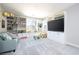 Bright living room with built-in shelving and cabinets provides ample storage at 2650 Skylark Trail St, Henderson, NV 89044