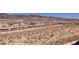 A view of the neighborhood with houses sprawling along with mountains in the distance at 2650 Skylark Trail St, Henderson, NV 89044