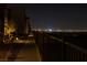 Sidewalk and landscaped yard showing the night skyline view of the Las Vegas Strip at 2650 Skylark Trail St, Henderson, NV 89044