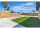 Backyard features a concrete patio and artificial turf at 2721 Bruce Cir, North Las Vegas, NV 89030