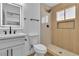 Updated bathroom featuring a modern vanity with sleek fixtures and a walk-in shower with stylish tile work at 2721 Bruce Cir, North Las Vegas, NV 89030