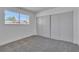 Bedroom features a window and a closet with sliding doors at 2721 Bruce Cir, North Las Vegas, NV 89030