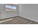 Bedroom features a window and neutral carpet at 2721 Bruce Cir, North Las Vegas, NV 89030