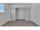 Bedroom featuring neutral carpet and a closet with sliding doors at 2721 Bruce Cir, North Las Vegas, NV 89030