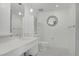 Bright bathroom featuring a modern vanity, toilet, and mirror with modern lighting at 29 Montelago Blvd # 213, Henderson, NV 89011