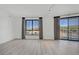 Spacious living room with large windows offering plenty of natural light at 29 Montelago Blvd # 213, Henderson, NV 89011