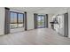 Bright and open living space with large windows, stainless steel appliances and a sliding glass doors at 29 Montelago Blvd # 213, Henderson, NV 89011