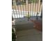 Image of several lockboxes attached to a metal gate near a building with tan walls and metal bars at 29 Montelago Blvd # 213, Henderson, NV 89011