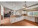 Eat-in kitchen with stainless steel appliances, a gas range and open to the living room at 3151 Coachlight Cir, Las Vegas, NV 89117