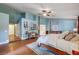 Large main bedroom with sitting area, ensuite bathroom and high ceilings at 3151 Coachlight Cir, Las Vegas, NV 89117