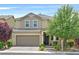 Charming two-story home featuring a two-car garage and a well-maintained, landscaped front yard at 3171 Biccari Ave, Henderson, NV 89044