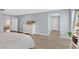 Open main bedroom with wood-style floors, natural light, and an open doorway into the living area at 3171 Biccari Ave, Henderson, NV 89044