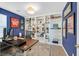 Well-appointed office with built-in shelving, a spacious desk, and tasteful decor at 3171 Biccari Ave, Henderson, NV 89044