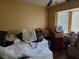 Bedroom with natural light from a window, and wood-look flooring at 3261 Winery Rd, Pahrump, NV 89048