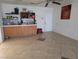 Open bonus room features ceramic tile and storage at 3261 Winery Rd, Pahrump, NV 89048