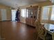 Traditional dining room features hardwood floors and window views at 3261 Winery Rd, Pahrump, NV 89048