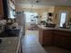 Kitchen featuring tile floors, stainless appliances, and ample counter space at 3261 Winery Rd, Pahrump, NV 89048
