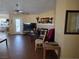 Open living room area featuring tile flooring and natural light at 3261 Winery Rd, Pahrump, NV 89048