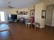 Open living room area with tile flooring and a ceiling fan at 3261 Winery Rd, Pahrump, NV 89048