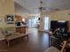 Spacious living room with adjacent kitchen and tile flooring throughout at 3261 Winery Rd, Pahrump, NV 89048
