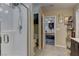 A sleek bathroom featuring a glass-enclosed shower and modern fixtures at 3707 Paseo De Paz Ave, Las Vegas, NV 89115
