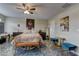 A spacious bedroom decorated with elegant furniture and vibrant wall art at 3707 Paseo De Paz Ave, Las Vegas, NV 89115