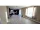 Open living area with updated flooring, natural light, and easy access to the kitchen at 3707 Paseo De Paz Ave, Las Vegas, NV 89115