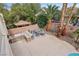 Aerial view of outdoor kitchen, covered patio, and built-in barbecue area at 4042 Keefe Falls Ct, North Las Vegas, NV 89085