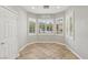Bright breakfast nook with bay windows and plantation shutters at 4042 Keefe Falls Ct, North Las Vegas, NV 89085