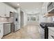 Bright kitchen with stainless steel appliances and a breakfast nook with bay windows at 4042 Keefe Falls Ct, North Las Vegas, NV 89085