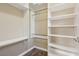 Walk-in closet with custom shelves and clothing rods, providing ample storage at 4042 Keefe Falls Ct, North Las Vegas, NV 89085