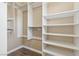 Walk-in closet with custom shelves and rods offering plenty of storage at 4042 Keefe Falls Ct, North Las Vegas, NV 89085