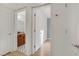 Bathroom vanity with dark wood cabinets and an adjacent doorway at 4310 Sandy River Dr # 70, Las Vegas, NV 89103