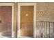 Brown front door with white trim and unit number 70, located on a stucco building at 4310 Sandy River Dr # 70, Las Vegas, NV 89103