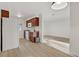 Kitchen with white appliances, and warm wood cabinets at 4310 Sandy River Dr # 70, Las Vegas, NV 89103
