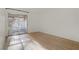 Bright, open room with a sliding glass door and modern flooring at 4310 Sandy River Dr # 70, Las Vegas, NV 89103