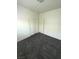 This is a bedroom featuring carpeted floors and a closet at 4645 Fuchsia Nights Ave # 103, North Las Vegas, NV 89084