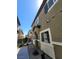 Street view of a well-kept home with a clean walkway, modern design, and bright windows at 4645 Fuchsia Nights Ave # 103, North Las Vegas, NV 89084