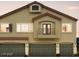 Charming three-story townhome with three car garage and a small balcony with double doors at 4645 Fuchsia Nights Ave # 103, North Las Vegas, NV 89084