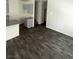 Inviting living room featuring modern wood flooring and neutral walls at 4645 Fuchsia Nights Ave # 103, North Las Vegas, NV 89084