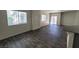 Spacious living area with hardwood floors and natural light at 4645 Fuchsia Nights Ave # 103, North Las Vegas, NV 89084