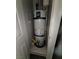 Enclosed utility closet with hot water tank at 4645 Fuchsia Nights Ave # 103, North Las Vegas, NV 89084