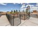 Community dog park featuring a fenced area with seating and waste disposal stations at 4839 Orchid Ridge Ave # 96, Las Vegas, NV 89141