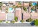 Aerial view of neighborhood homes showcasing backyard layouts and landscaping at 5017 Hadley Meadow Ct, Las Vegas, NV 89131