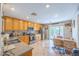 Bright kitchen with stainless steel appliances, tiled floors, and ample counter space at 5017 Hadley Meadow Ct, Las Vegas, NV 89131