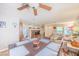 Open-concept living room with combined living and dining areas, plenty of light, and modern decor at 5017 Hadley Meadow Ct, Las Vegas, NV 89131