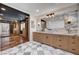Luxurious bathroom featuring double vanity, marble countertop, and hardwood floors at 5239 Tartan Hill Ave, Las Vegas, NV 89141